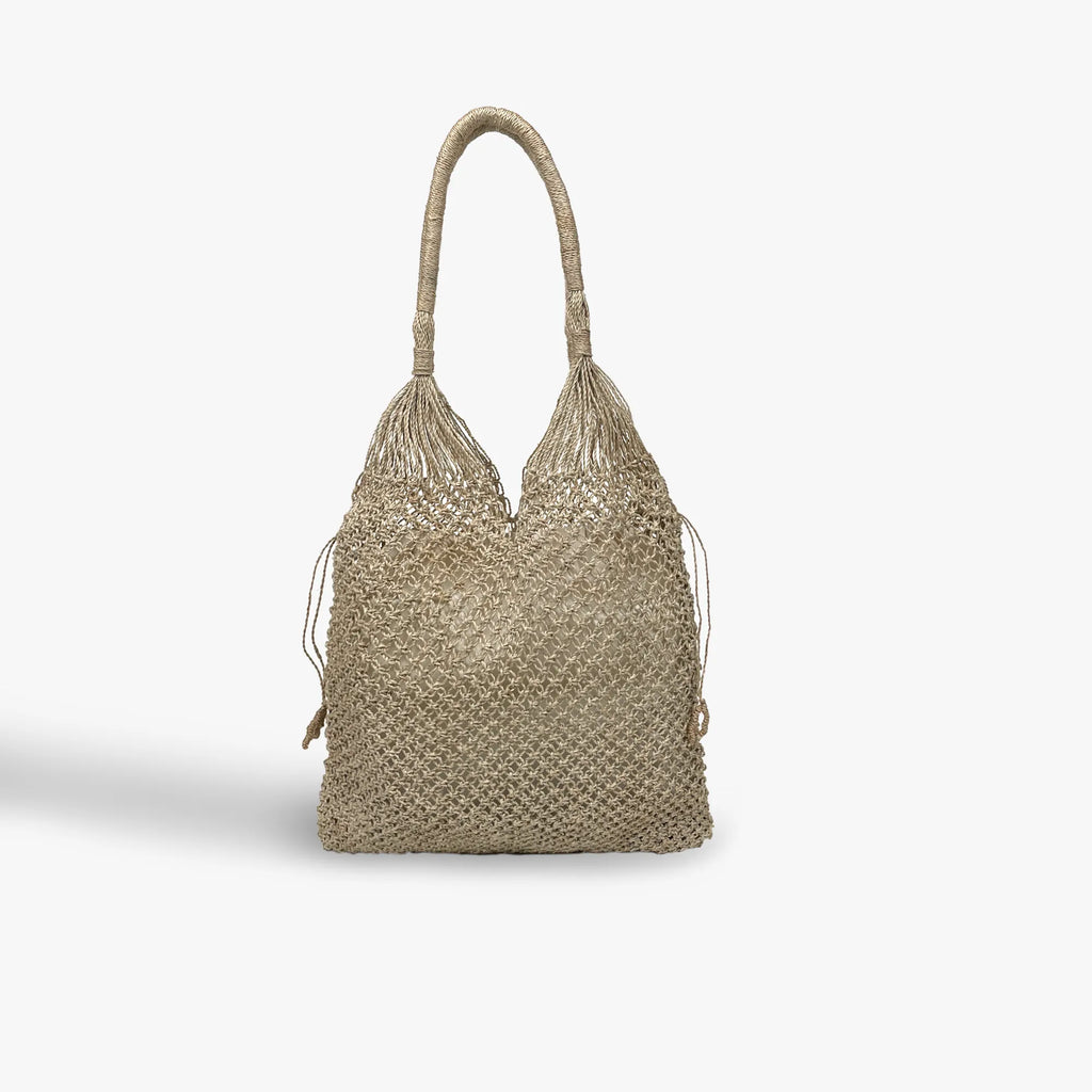 Woven handbag on a light gray background