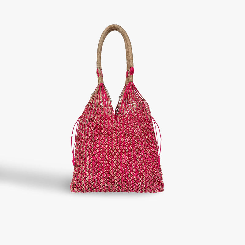 Pink woven handbag with a wooden handle on a white background