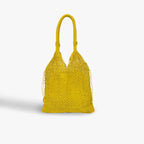 Yellow woven handbag on a light gray background