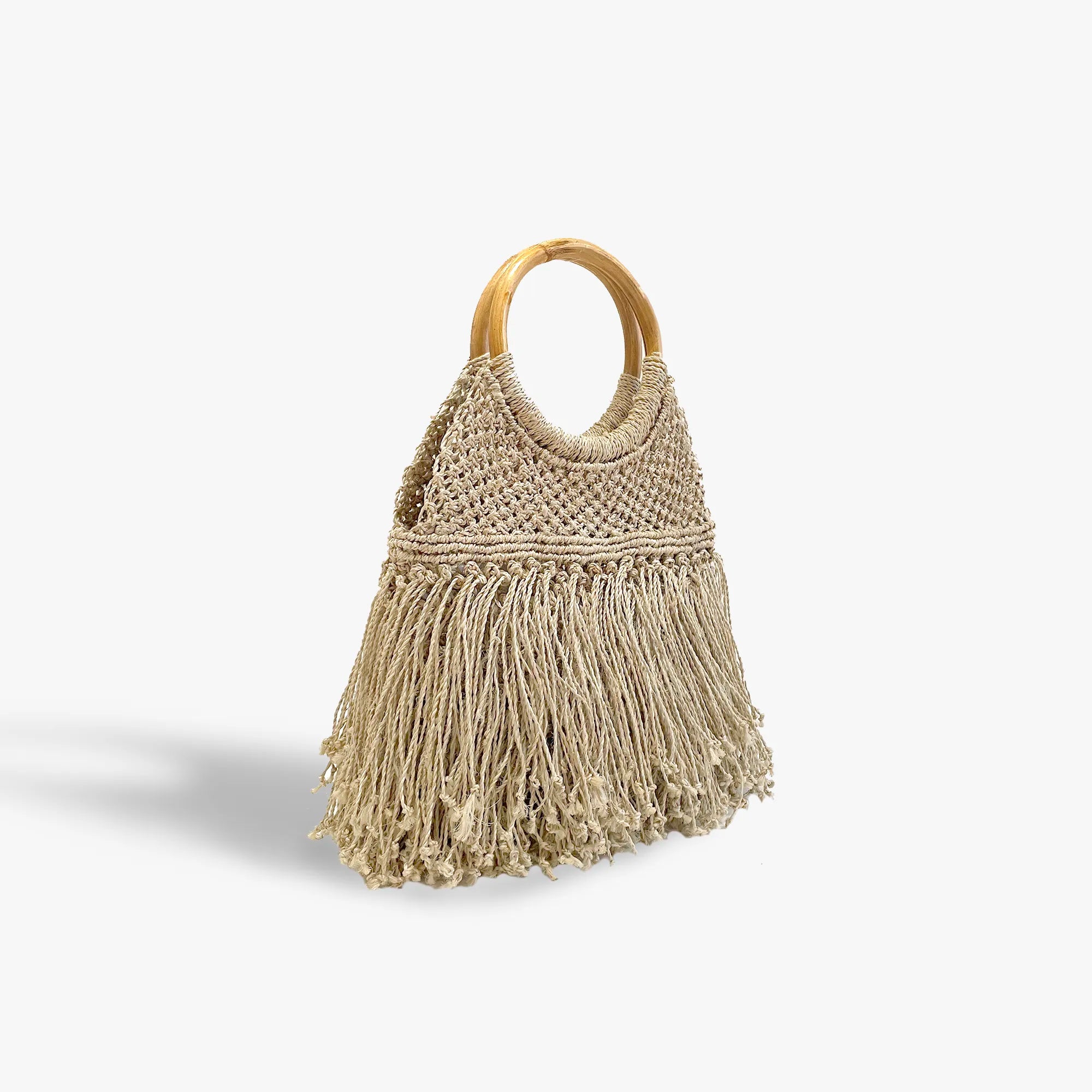 Macrame handbag with wooden handle on a white background