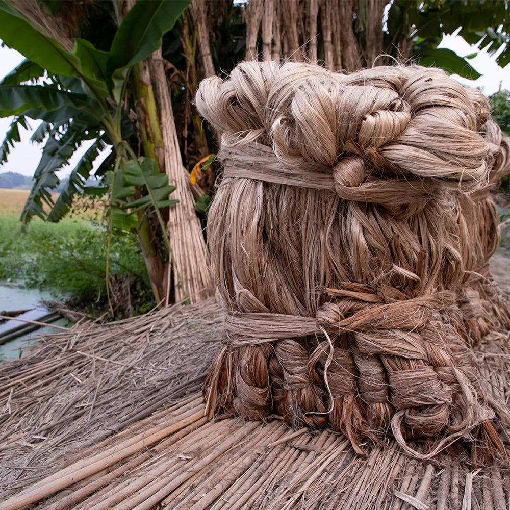 Braided straw or palm fibers on a thatched roof with natural background